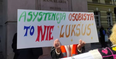 Kolorowy transparent "Asystencja osobista to nie luksus"