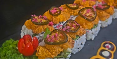 SR27 Chicken Karaage Roll $19.99 - avocado, cucumber, shiitake mushroom, jalapeno, lettuce with chicken karaage on top