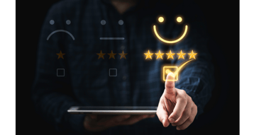 a person holding a tablet with a smiley face drawn on it
