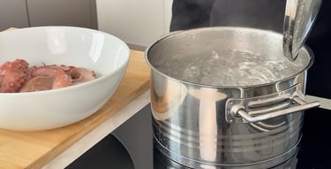 Bring water to boil for pulpo a la gallega