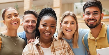 a group of people standing around a table