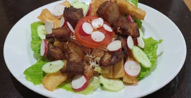 yuca con chicharrón