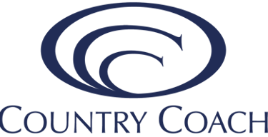 Official Country Coach motorhome logo featuring blue oval emblems on a black background.