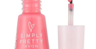 Avon Simply Pretty Color Me Pretty pink nail enamel bottle with an open applicator brush.