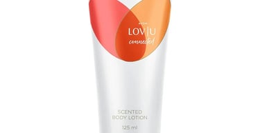Avon Lov|U Connected scented body lotion tube with a heart design on a white background.