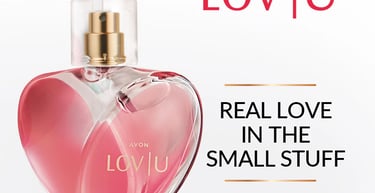 Avon Lov U pink heart-shaped perfume bottle featuring floral fruity fragrance notes on a white background.