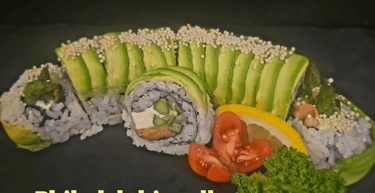 SR26 Philadelphia Roll $17.99 - smoked salmon, cucumber, asparagus, cream cheese with avocado on top