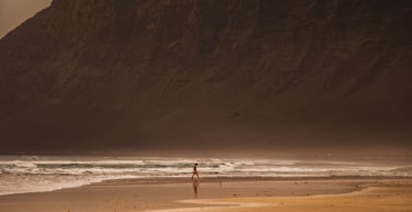 a person standing on a beach 
