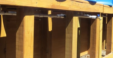 Pipe connecting the water barrels