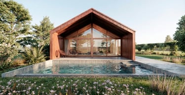 Vista desde pileta hacia casa con grandes ventanales y galería integrada. arquitectura con sentido. 