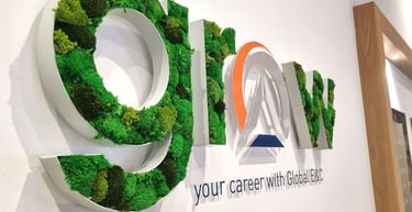 a sign that says go green with mossel mossel