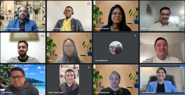 Screenshot of a Zoom call with 10 coaches in a grid view, each smiling and engaged in conversation
