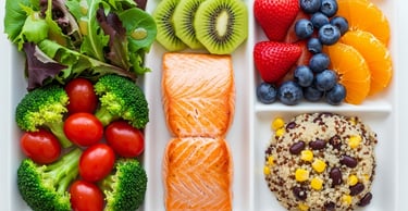 plate-with-vegetables-fruits-whole-grains-and-proteins-arranged-neatly-for-a-balanced-diet