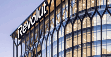 a large building with a sign that says Revolut