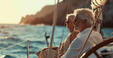 a man and woman sitting on a boat