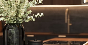 a vase with a vase of flowers in a kitchen