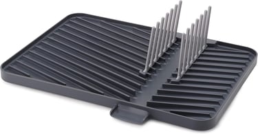 a black and white tray with a bunch of knives and knives