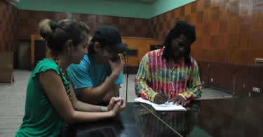 Rey Escobar with the Grammy Award Winner Mayito  Rivera (Van Van) and visual artist Daviana Basilio.