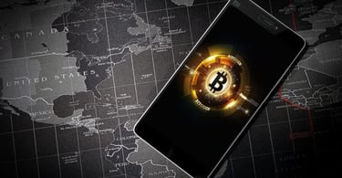a smartphone with bitcoin on the screen