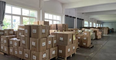 Inside the factory warehouse, neatly arranged shelves and goods