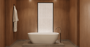 Freestanding bathtub in wood-paneled minimalist bathroom with soft lighting and grid-screen window.