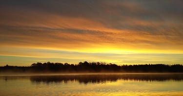 beautiful sunset in sweden. there are clouds that seem to be on fire. perfect for pike fishing  