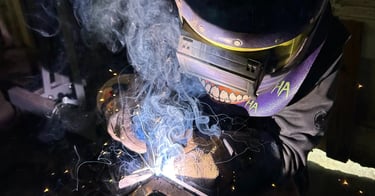 jaspar schirmer welding a steel beam