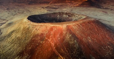 a volcano  with a volcano in the background