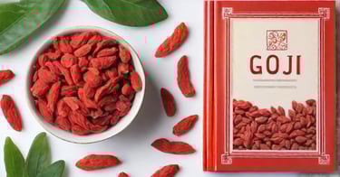 a bowl of goji berries and a book of goji berry