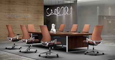 Conference room with tan leather swivel chairs and wooden table