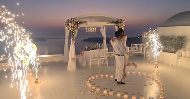 Memorable Santorini proposal marked by elegant stage fireworks under the stars.