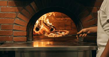 pizza coming out of Rome oven