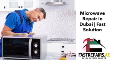 a man in a blue shirt is writing on a microwave