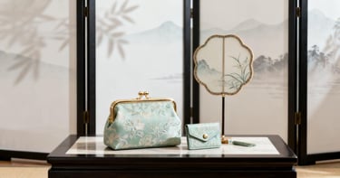 "The Splendid Rivers" GWP set, featuring a jacquard pouch, cardholder, and fan.