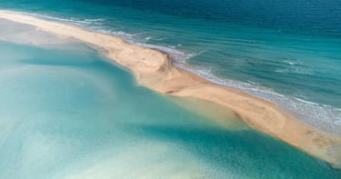 a beach with a sandy beach