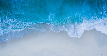Ocean waves rolling in on the beach to inspire spiritual growth and tansformation