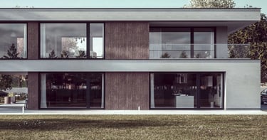 a house with a balcony and a car parked in front of it