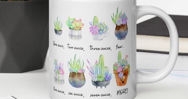 White succulent-themed ceramic mug with colorful plant illustrations — Miss Chatty Plants drinkware collection.