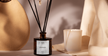 a vase with a candle and a candle in a vase