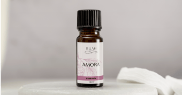 a bottle of aroma oil with a white background