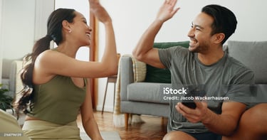 a man and woman sitting on a couch