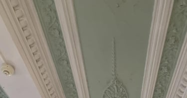 a ceiling painted white and green by pbp services at a home in pershore