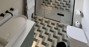 fully tiled shower enclosure with glass door in Worcester home