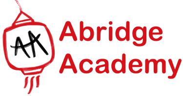a red Chinese lantern with the words abridge academy next to it