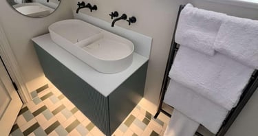 Elegant bathroom renovation with corner shower and chrome fixtures in Evesham Ask ChatGPT