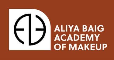 a brown and white logo with the words aliya bag academy of makeup