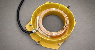 Heating system of an industrial bearing washing machine for improved oil removal