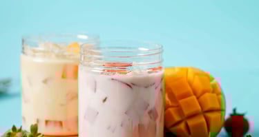 Two smoothie glasses on the table