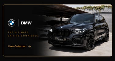 A sleek black luxury BMW SUV parked in a car rental lot with 'The Ultimate Driving Experience' text.