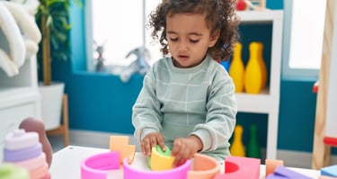 toddler playing with blocks